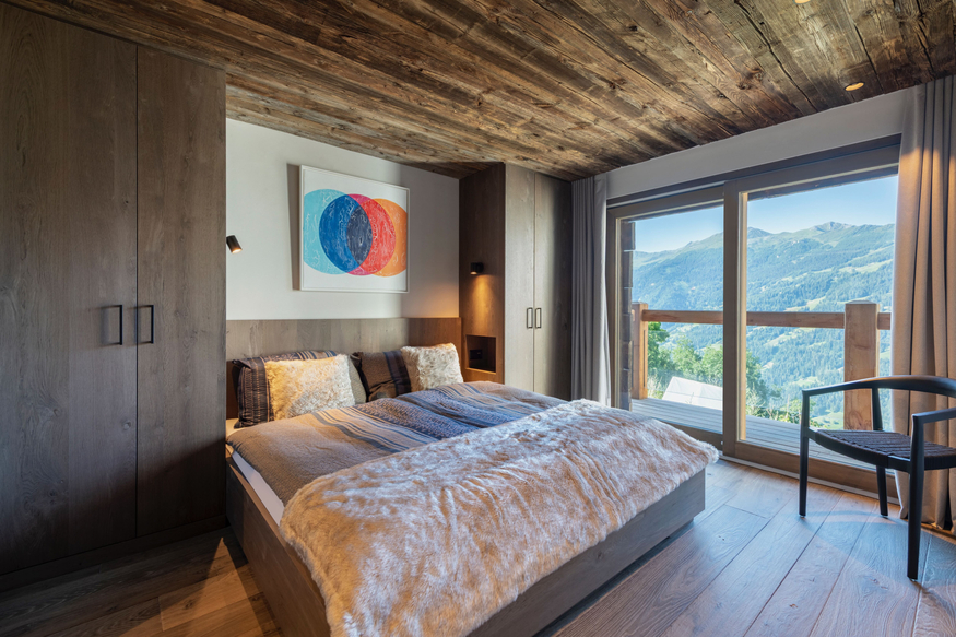 appartement-le-bry-c02-verbier-chambre-vue-balcon-09.jpg