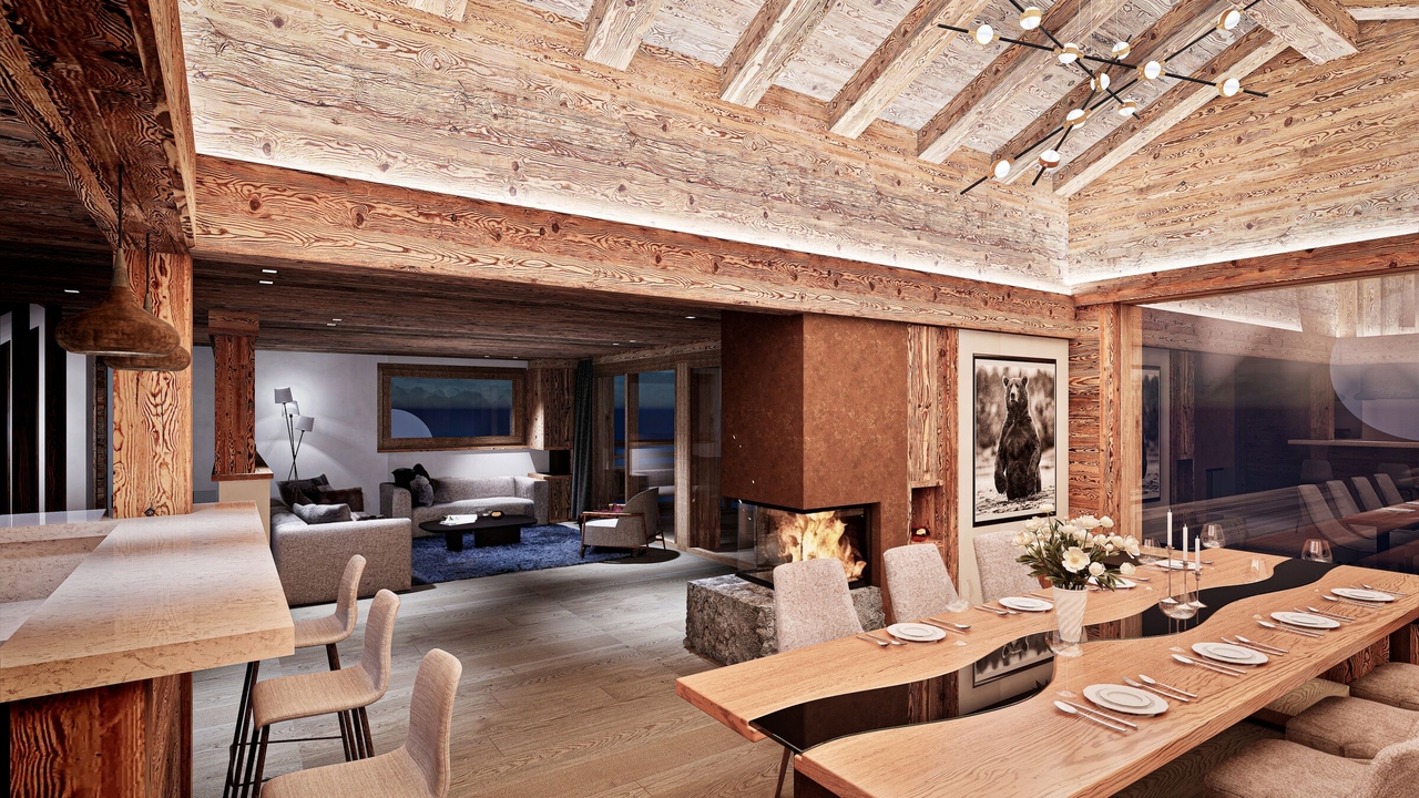 Vue intérieure salle à manger avec cheminée – Chalet Chaperon Rouge à vendre - Verbier
