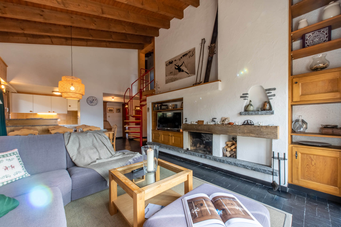 appartement-carina-251-verbier-salon-cheminee-01.jpg