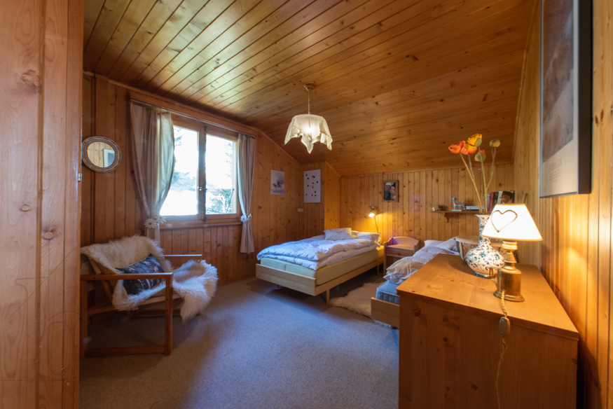 appartement-airelles-combles-verbier-chambre-vue-ensemble-07.jpg