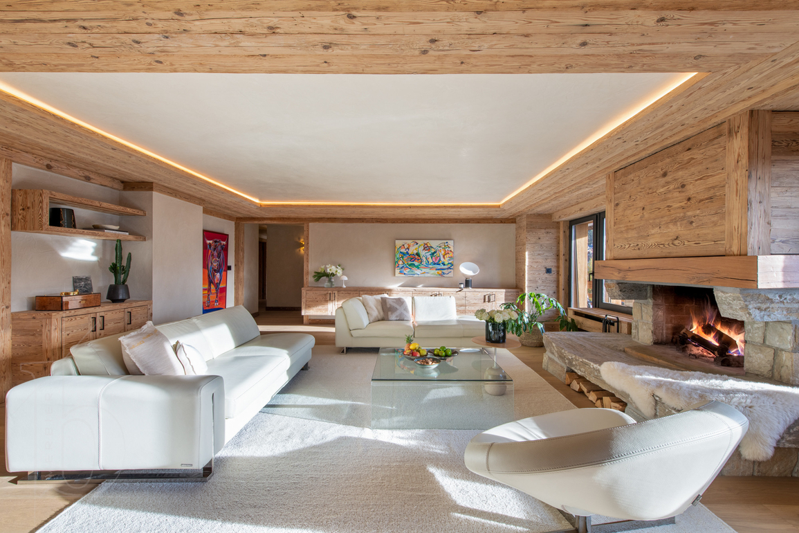 appartement-madelia-verbier-salon-cheminee-03.jpg