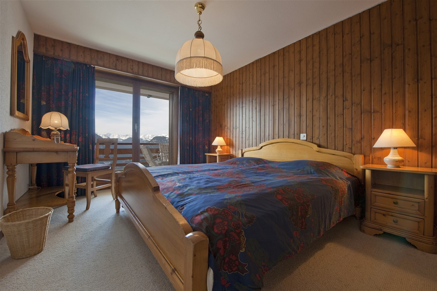 appartement-flaminia-326-verbier-chambre-chaleureuse-11.jpg