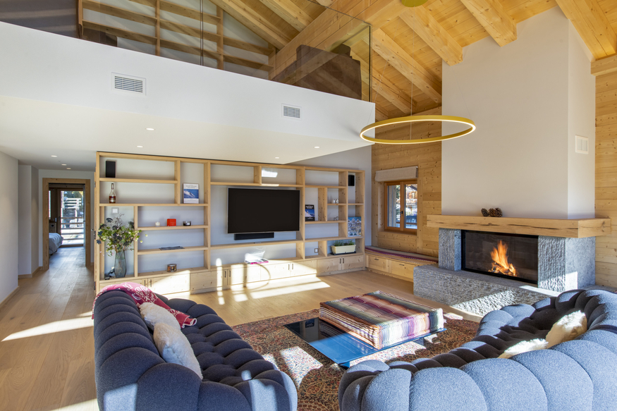 appartement-gran-paradiso-222-verbier-salon-cheminee-vue-2-07.jpg
