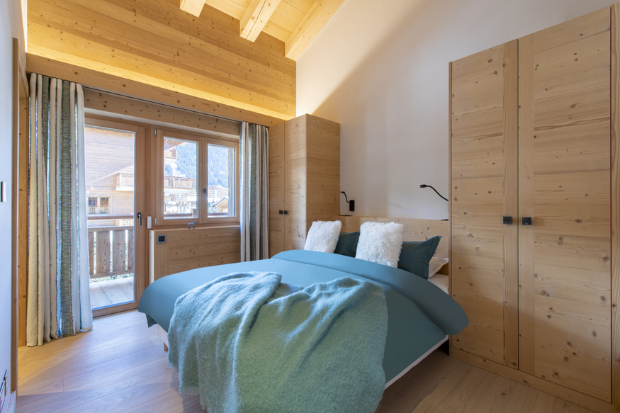 appartement-gran-paradiso-222-verbier-chambre-double-lit-17.jpg