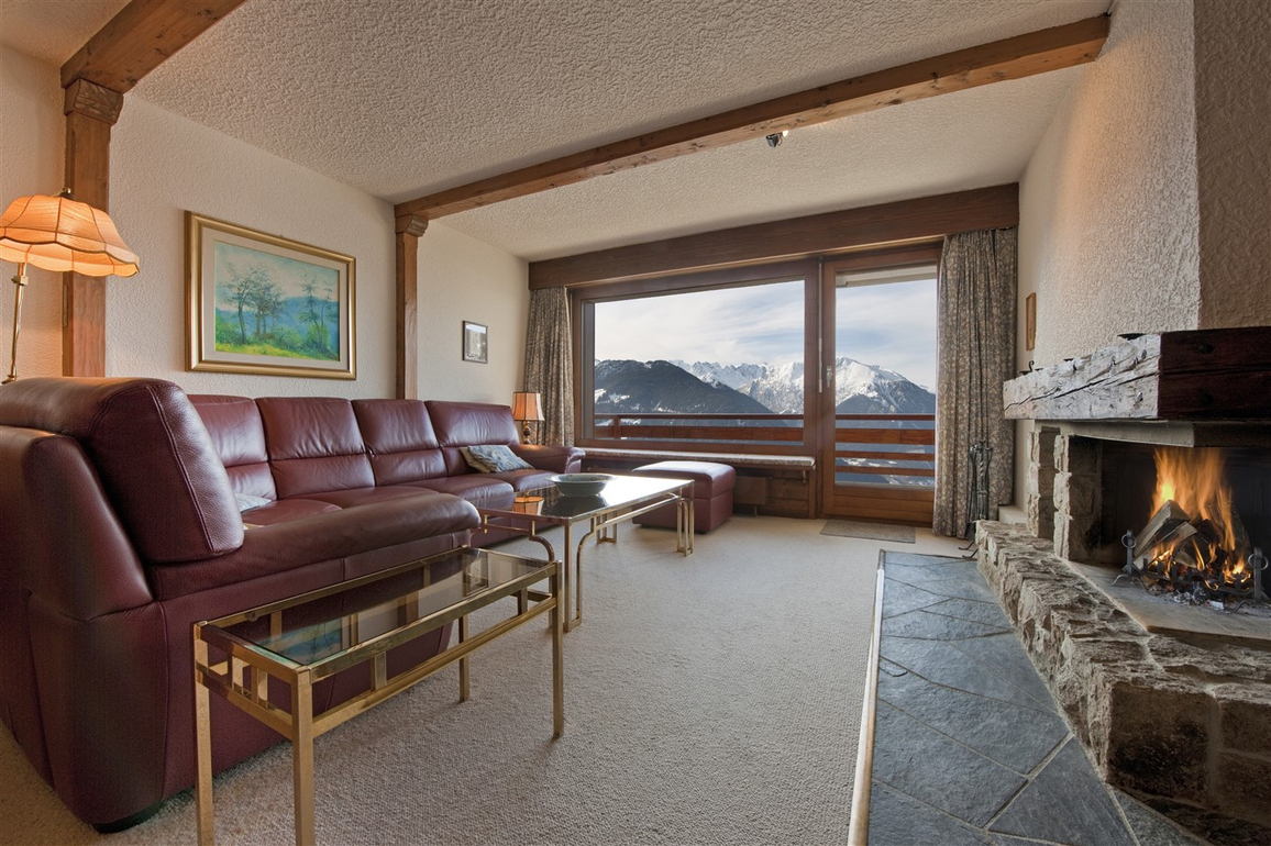 appartement-flaminia-326-verbier-salon-lumineux-vue-01.jpg